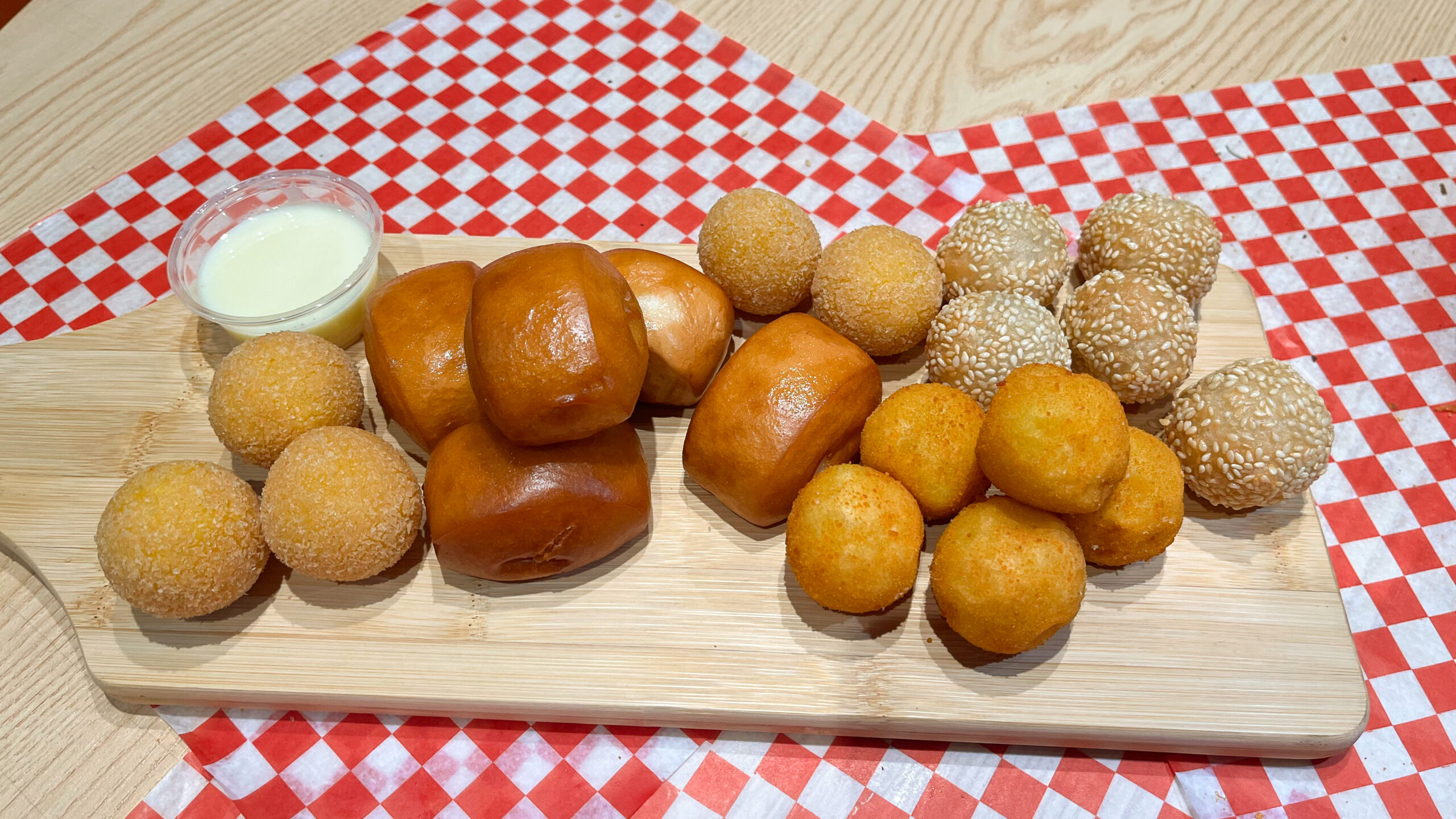 fried doughnuts with dip on the side
